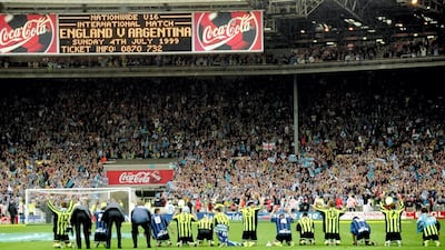 City's players acknowledge the large City support at Wembley Stadium.
