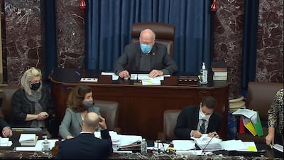 Senator Patrick Leahy, the president pro tempore of the Senate, announces passage of Senate version of the Covid-19 relief bill by a vote of 50-49 in the Senate at the US Capitol in Washington. Senate Television via AP