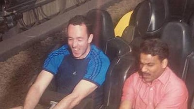 Liam Murphy with Shakiha, the taxi driver he took to Ferrari World with him. Courtesy Liam Murphy