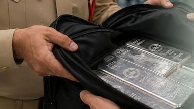 Dubai Police successfully returned a bag containing silver bars to an Asian passenger at Dubai International Airport. Photo: Dubai Police