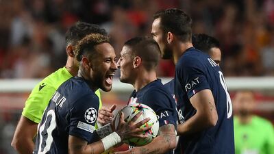 Paris Saint-Germain's Brazilian forward Neymar reacts to receiving a yellow card. AFP