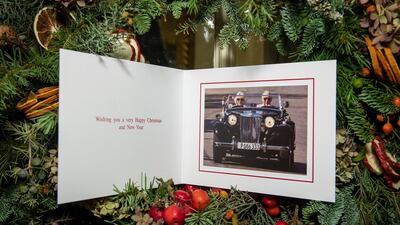 Britain's Prince Charles and Camila, Duchess of Cornwall display their card on a Christmas tree in Clarence House, London. AP