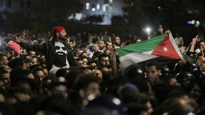 Flags are waved during the Amman demonstrations. Andre Pain / EPA