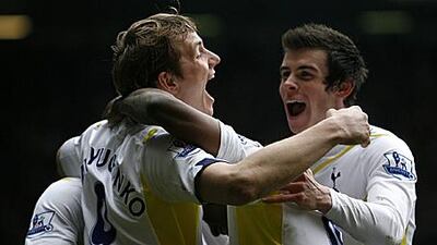Tottenham's Roman Pavlyuchenko, left, celebrates his first goal against Blackburn yesterday.