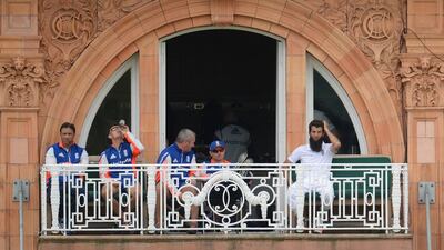 England’s Moeen Ali and Ian Bell with acting coach Paul Farbrace and batting coach Mark Ramprakash on the balcony during the first day. Philip Brown / Reuters / May 21, 2015