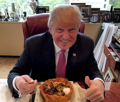 Donald Trump dines on a taco bowl in celebration of Cinco de Mayo in 2016. Photo: @realDonaldTrump / X