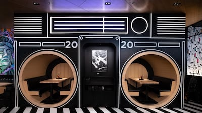 The new venue's signature interiors include a ‘boombox booth’ and ‘cassette wall’, keeping its old-school, hip hop roots in mind. All photos courtesy Black Tap Dubai