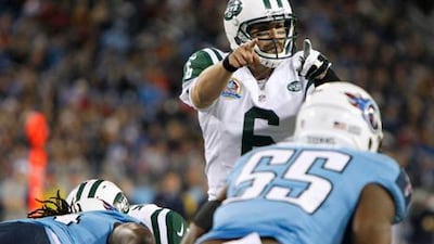 New York Jets' Mark Sanchez calls a play against the Tennessee Titans.