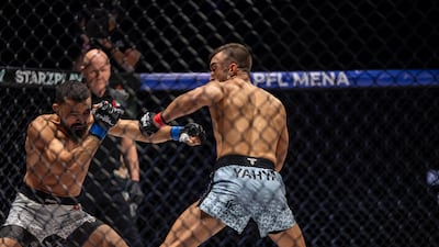 Mohammad Yahya, right, goes on the attack against Mehdi Saadi.