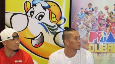 Barangay players Mark Caguioa, left, and JayJay Helterbrand. Jonathan Raymond / The National