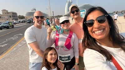 Farah Andrews and her friends after finishing the Burj2Burj Half Marathon. Farah Andrews / The National