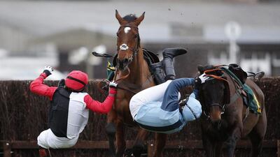 Victoria Pendleton riding Pacha Du Polder, left, is unseated during The Betfait Switching Saddles “Grassroots” Fox Hunters’ Steeple Chase along with Carey Williamson riding Baltic Blue, right, at Fakenham racecourse in Fakenham, England. Alan Crowhurst / Getty Images