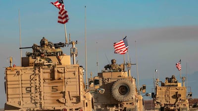 A convoy of US armoured vehicles patrols the village of Ein Diwar in Syria's northeastern Hasakeh province. AFP