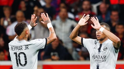 Paris Saint Germain's Kylian Mbappe and Neymar celebrate. EPA