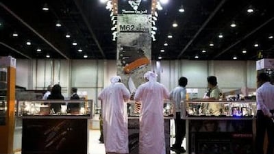 Two visitors admire knives at a booth during the Adihex in the capital. Lee Hoagland / The National