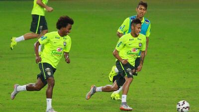 Brazil national soccer team players Willian, left, and Neymar, right, during a training session at Bei Rio Stadium in Porto Alegre, Brazil, 09 June 2015. EPA/Silvio Avila