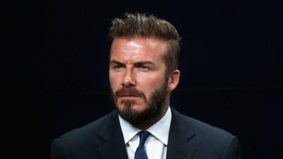David Beckham shown during a charity event in London on Monday. Chris Jackson / Getty Images / June 9, 2014