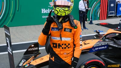 McLaren's Lando Norris of Britain celebrates his pole position after qualifying at the Zandvoort racetrack. AP