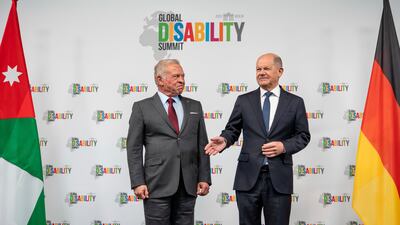 Jordan's King Abdullah II, left, and Germany's departing Chancellor Olaf Scholz opened the disability summit in Berlin on Wednesday. AP