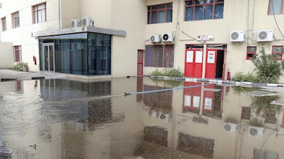 Ground staff pumped rain water from the pitch to outside the stadium in an effort to get the match on.