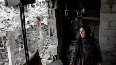 A Gazan woman in the remains of her badly damaged house in Shajaya, Gaza, Palestine, in September 2014. Courtesy Celia Peterson