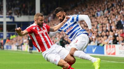 Armand Traore of QPR is tackled by Phil Bardsley of Stoke City during their Premier League match on Saturday. Jamie McDonald / Getty Images
