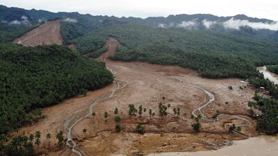 An aerial view shows the scene of a landslide which hit the village of Kantagnos in Baybay town in the Philippines, following heavy rains brought about by tropical storm Megi. AFP