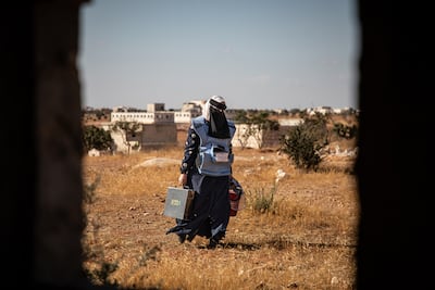 Team leader Hiba Kadaa walks to a safe zone to detonate unexploded ordnance. Photo: Halo Trust