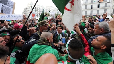 Algerian protesters shout slogans during a demonstration in Algiers. EPA