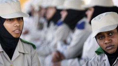 Hanan Mohmmed al Katheeri, left, and Mona Bushra al Awad are cadets at the Police Women Training Section of the Abu Dhabi police.