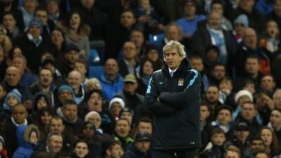 Manchester City manager Manuel Pellegrini observes his side on Tuesday during their League Cup match against Hull City. Andrew Boyers / Action Images / Reuters