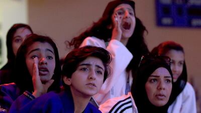 Audiences cheering on Monday at the Abu Dhabi Jiu-Jitsu Children's World Championship at Zayed Sports City. Ravindranath K / The National