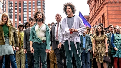 Jeremy Strong and Sasha Baron Cohen, in the foreground, in a scene from Netflix's 'The Trial of the Chicago 7'. AP