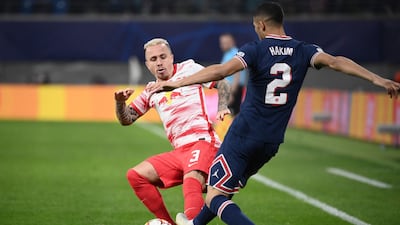 Angelino - 6: No repeat of the deadly balls into middle he produced in Paris reverse fixture but came close to scoring in second half but goal-bound strike was blocked by Marquinhos and stopped Hakimi offering much of a threat going forward. AFP