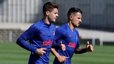 Alvaro Morata (L) and Vitolo (R) during a training session at Wanda Sport City. EPA