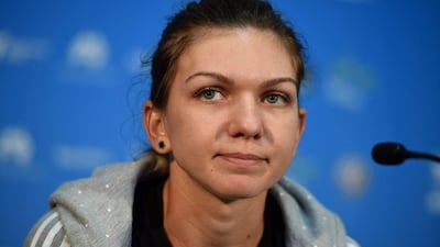 Simona Halep addresses a press conference on Tuesday after pulling out of the Sydney International with an illness. Dan Himbrechts / EPA / January 13, 2015