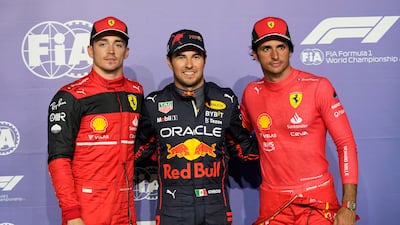 Ferrari's Charles Leclerc, pole position Sergio Perez and third placed Ferrari driver Carlos Sainz after the qualifying session/. AP