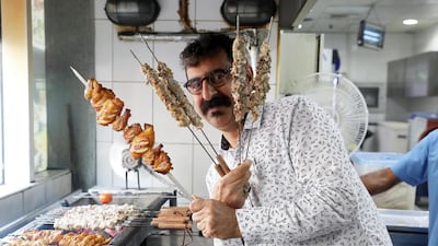 Al Ustad Special Kebab owner Majeed Al Ansari says his restaurant has two golden rules: ‘Serve good food and respect the people. Pawan Singh / The National