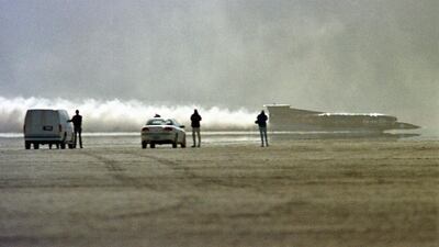 Andy Green takes Thrust, which looks more like a wingless aircraft than a car, across Black Rock Desert near Gerlach, Nevada, on his record-breaking land speed bid in October 1997. Ben Margot / AP Photo