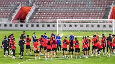 The UAE football team train at the Abdullah bin Khalifa Stadium in Doha ahead of their 2022 World Cup play-off against Australia on Tuesday. Photo: UAE FA