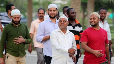People arrive to break their fast on the first day of Ramadan at the Sheikh Zayed Grand Mosque in Abu Dhabi. Pawan Singh / The National