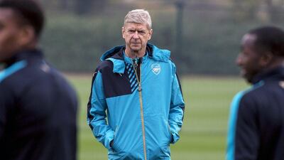 Arsenal manager Arsene Wenger leads his team's training session on Tuesday ahead of their Champions League match against Bayern Munich on Wednesday. Will Oliver / EPA / November 3, 2015