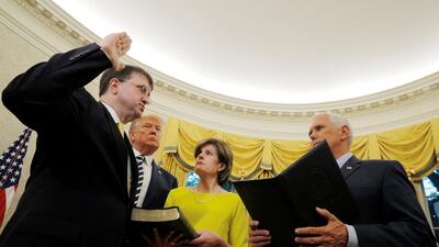 Robert Wilkie being sworn in on Monday as US Veterans Affairs Secretary. Returning soldiers often struggle with mental health issues. Brian Snyder / Reuters