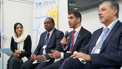 Dr Thani Al Zeyoudi, Minister of Climate Change and Environment, speaks at a panel during Cop23 in Bonn on Wednesday. Seen with Adnan Amin, director-general of Irena (right). Courtesy Irena