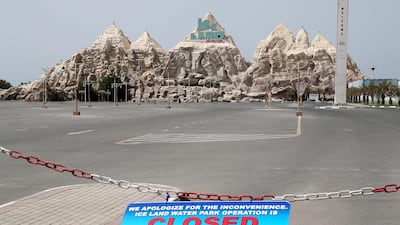 A closed sign has been put on display at the entrance of the Ice Land Water Park in RAK. Pawan Singh / The National