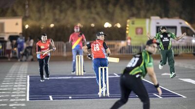 A batsman adds to his teams tally at the Global Village spectacle.