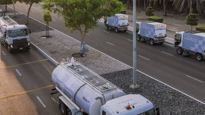 Automated street sweepers and washers, heavy equipment vehicles and water tankers will hit Abu Dhabi's roads. Photo: Abu Dhabi Media Office