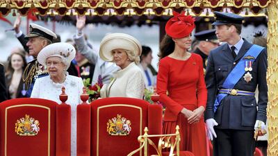 Prince Philip, Queen Elizabeth II, Camilla, Duchess of Cornwall, Catherine, Duchess of Cambridge and Prince William onboard the Spirit of Chartwell during the Diamond Jubilee Thames River Pageant in June 2012. Getty Images