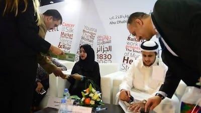 Zainab Al Tenaiji, left, and Mohammed Al Ghafli had their work published by Kuttab Publishing. Abu Dhabi Tourism and Culture Authority