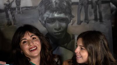 Diego Maradona's daughters, Dalma, right, and Yanina, before the presentation. AP